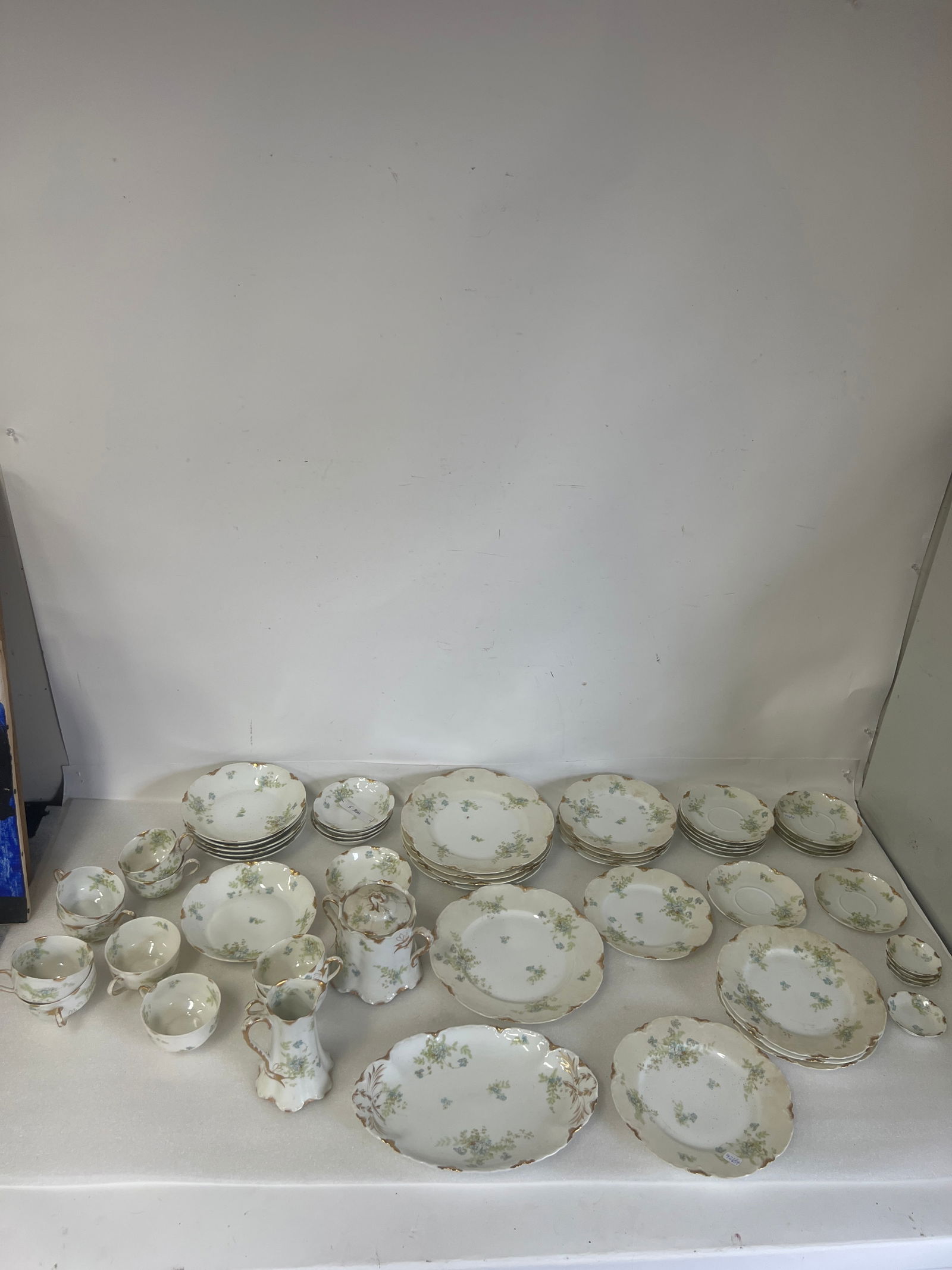 Haviland Limogwa China (54)): The Van Heusen Charles Co. 8 1/2" dinner plates (4) 9 1/2 Dinner plates (5)'; A pitcher, ten cups PLATTER 11 1/2""five sauce dishes 3" ; five saucers 5 1.2:D; six saucers 6"D; dessert plates (5) 7 1/2