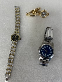 Gucci Watch and two others.