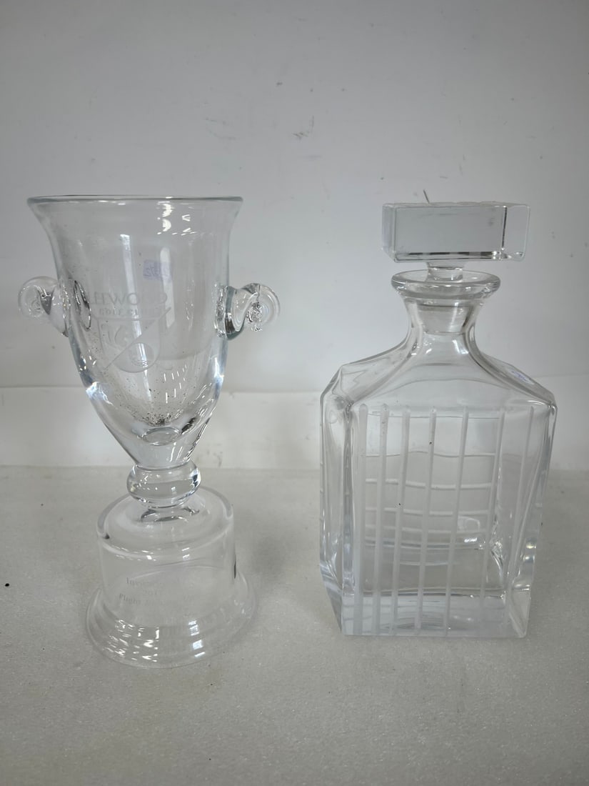 Paperweight Decanter & Leewood Golf Club Trophy: Trophy for 2011 Invitational. Decanter very heavy weight ans is 10"H, Trophy is the same height