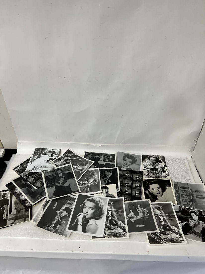 Bette Davis Movie Photos (25): All black and white Mostly 8 x 10 Includes printed list of her movies, the scenes depicted in the photographs, the year, the co-stars etc.