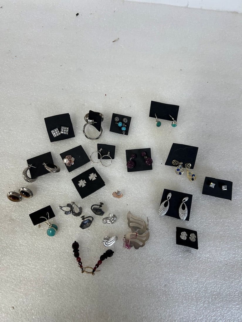 Sterling Silver Earrings 21 pair.: Twenty One Pr. Sterling Silver Earrings. As pictured. Good opportunity for dealer