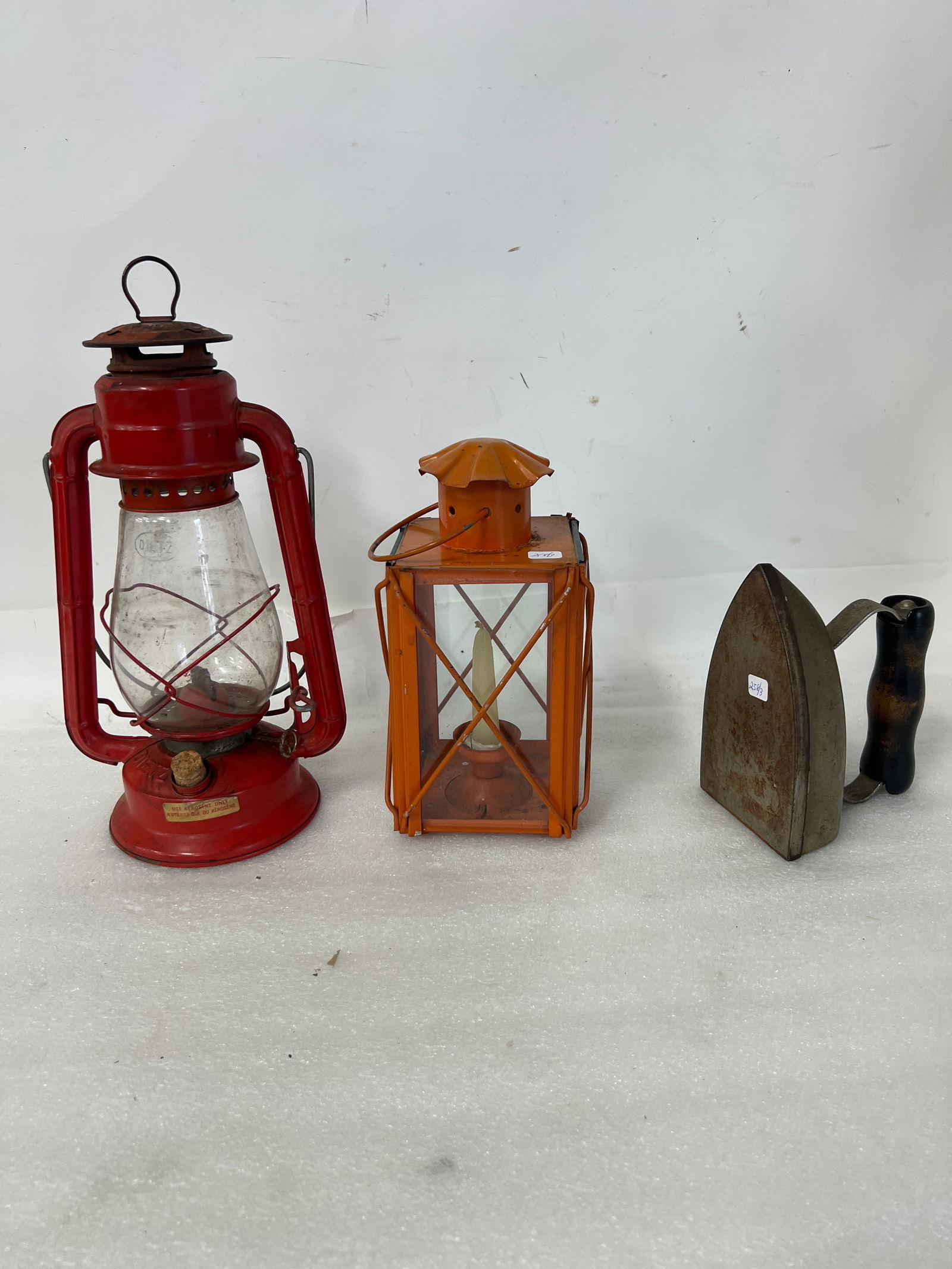 Antique Oil Lamp, Candle Lamp & American Beauty Iron (3): Two lamps, as pictured and an American Beauty Iron Three items in the lot.