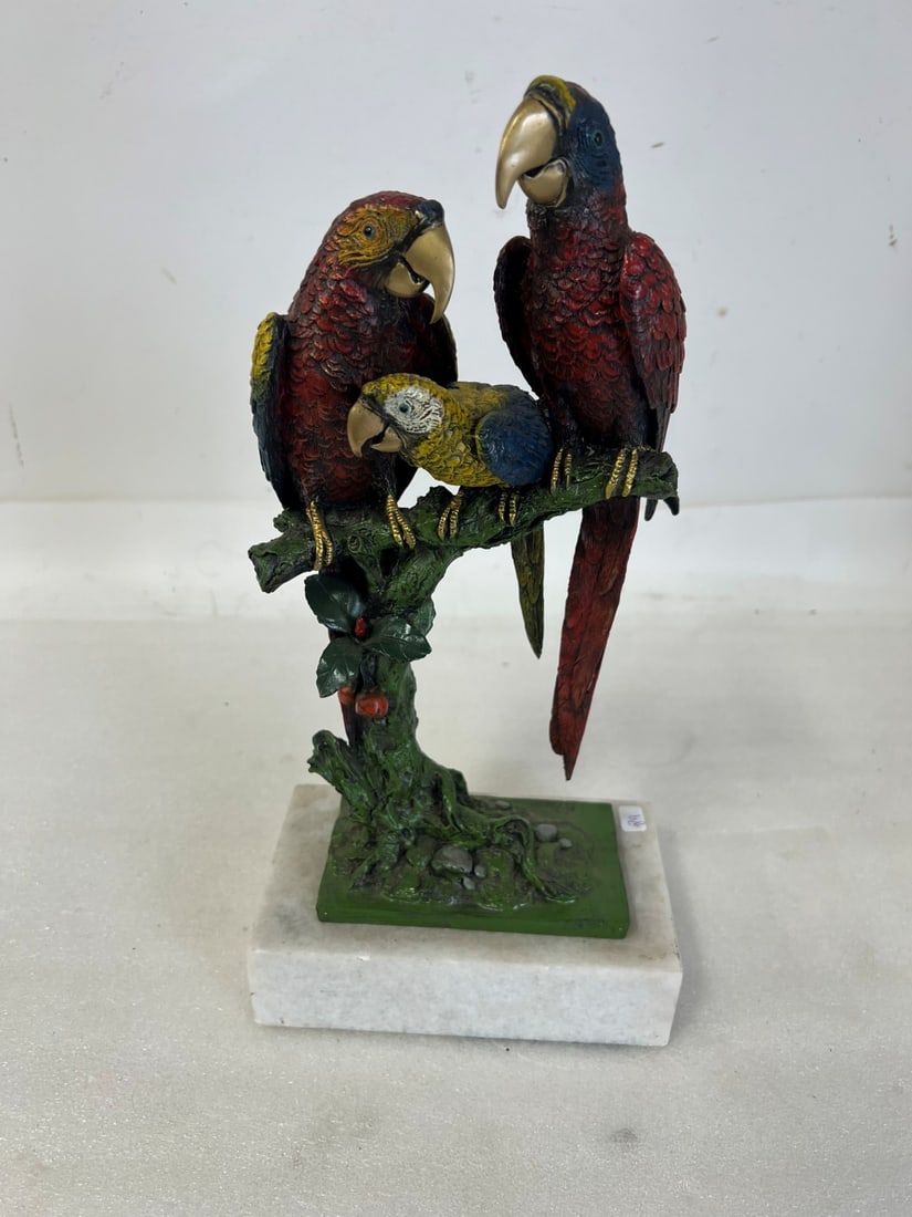 Polychromed Bronze Parrot on Marble Base: Signed on the bronze base "Milo". Multicolor. Overall 15.5"H by 7.5"W. Marble base is 2"H by 7.5"W