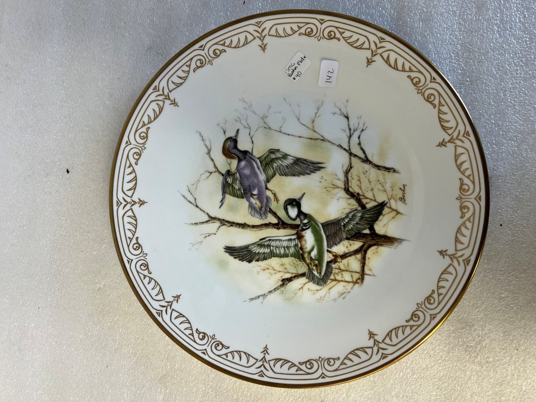 Limited Edition Edward Marshall Boehm "Hooded Mergansers" Collector Plate: Hand-crafted English bone china with a pure gold border. Plate is from the Water Bird Collection. 11" in diameter.