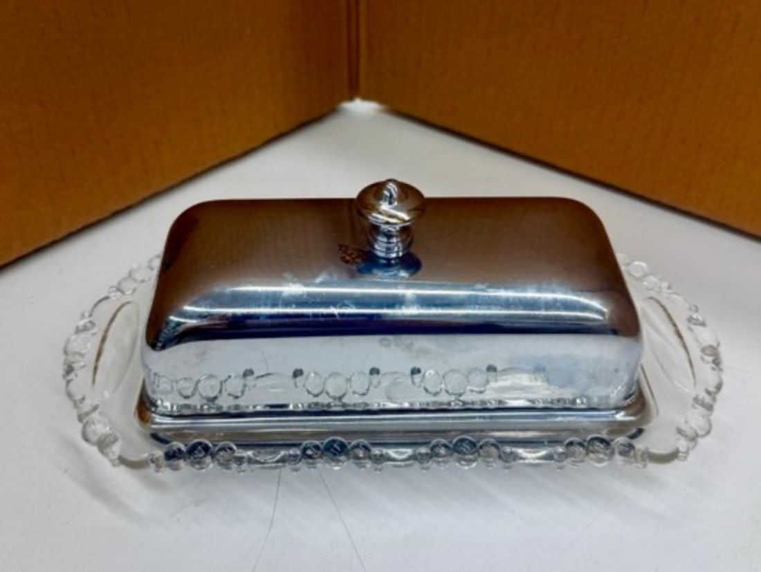 Vintage Butter Dish With Lid: Glass Tray with chrome or silver-platted lid. 3"H by 3.5"L by 7.75"W. no markings.
