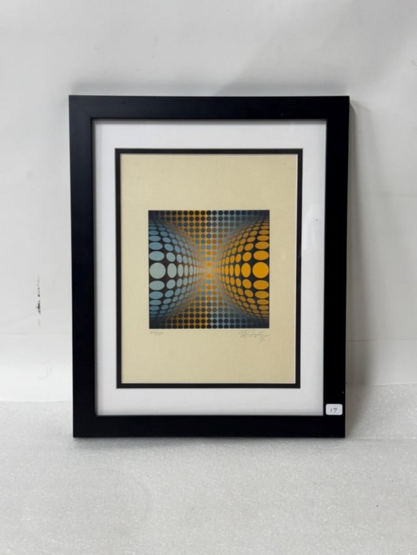 Victor Vasarely Lithograph Sgd: (Hungarian 1906-1997) Pencil signed lithograph of a blue and yellow sphere in an optical pattern , numbered 123/150 on heavy weight paper, 15 1/2? for height by 12 1/2? across