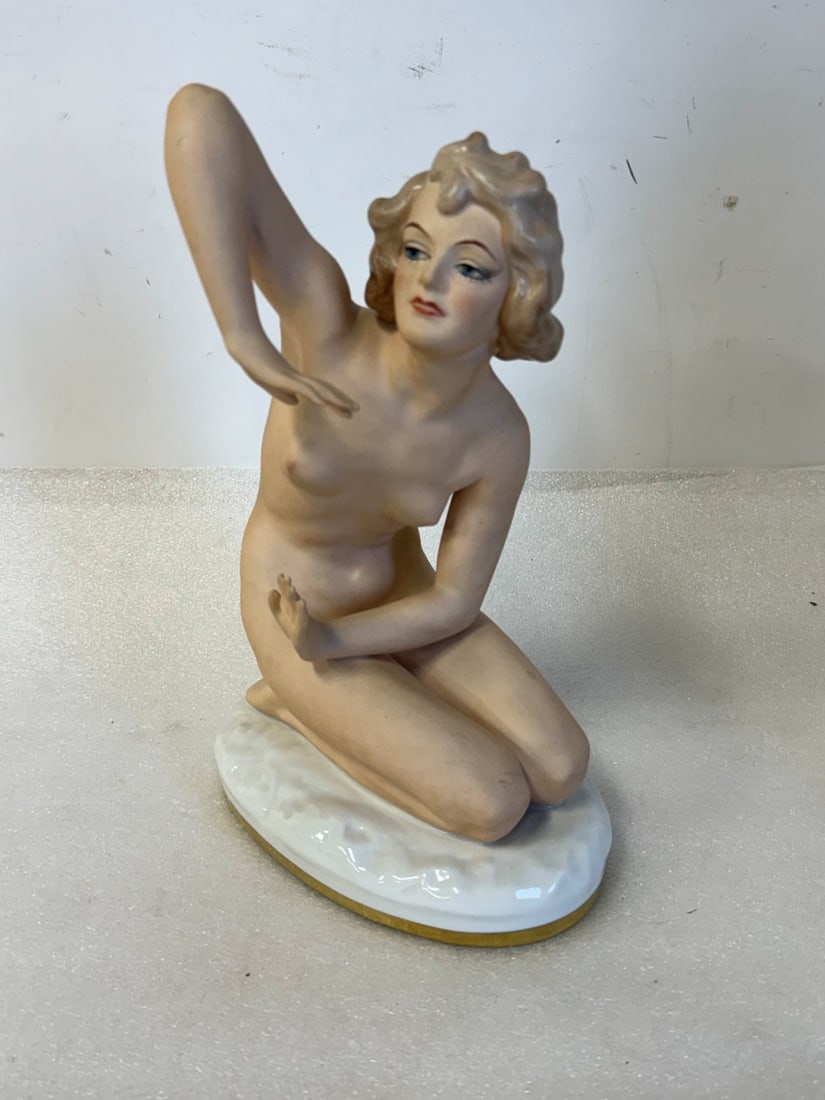 Gerold Bavaria Porcelain Figural Grouping: Hand painted porcelain grouping. Kneeling Nude. Marked at underside; 12in.H. x 8in.W.
