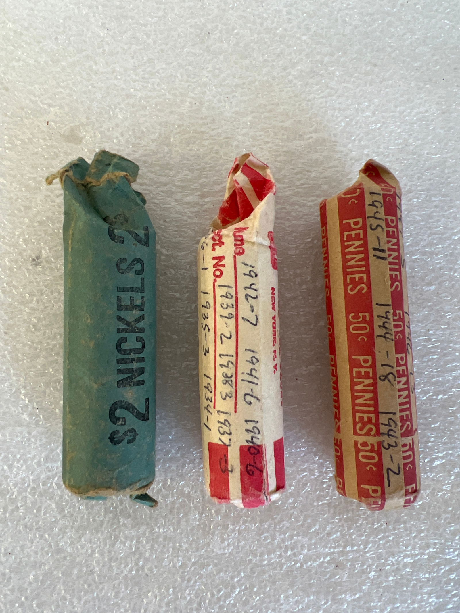 Collectors Lot of Coins-Outlined: Pennies. 1943-2, 1944-18, 1945-11, 1946-13, 1945-5Nickels.Partial,almost full roll; Pennies , 1918-1, 1919-2, 1920-1 1925-1 1934-1 1935-3 1936-1 1937-3 1938-3 1939-2 1940-6 1941-6 1942-7