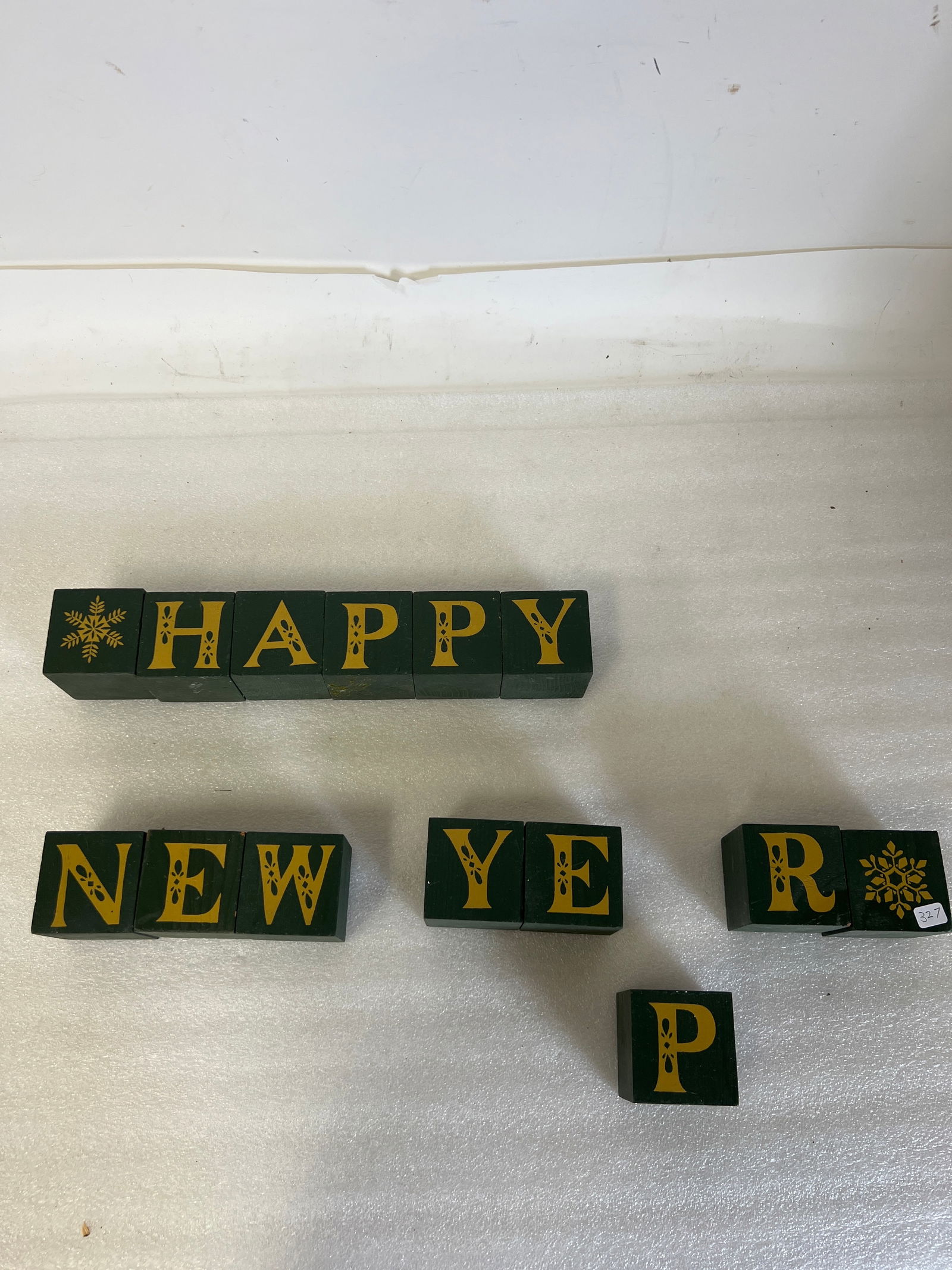 Merry Christmas/Happy New Year Wooden Blocks: Hand Painted. One side for Christmas. One side for the New Year. 2 1/2" square. Missing an A for Happy New Year but can use A from Merry Christmas.