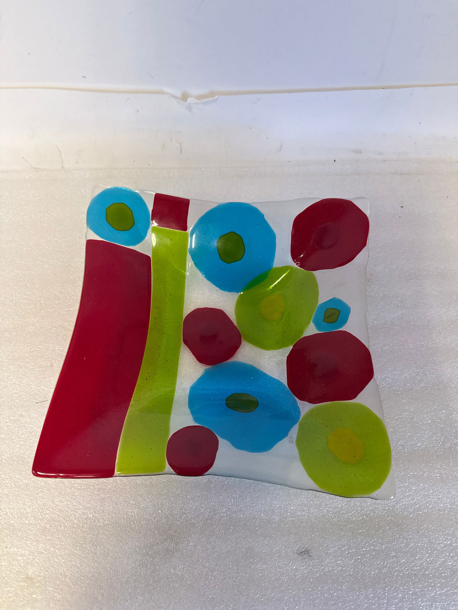 20thC. Modernist Glass Dish after Karel Appel: Modernist glass dish after Karel Appel. Internal colored design; 2.5in.H. X 15.5in.W.