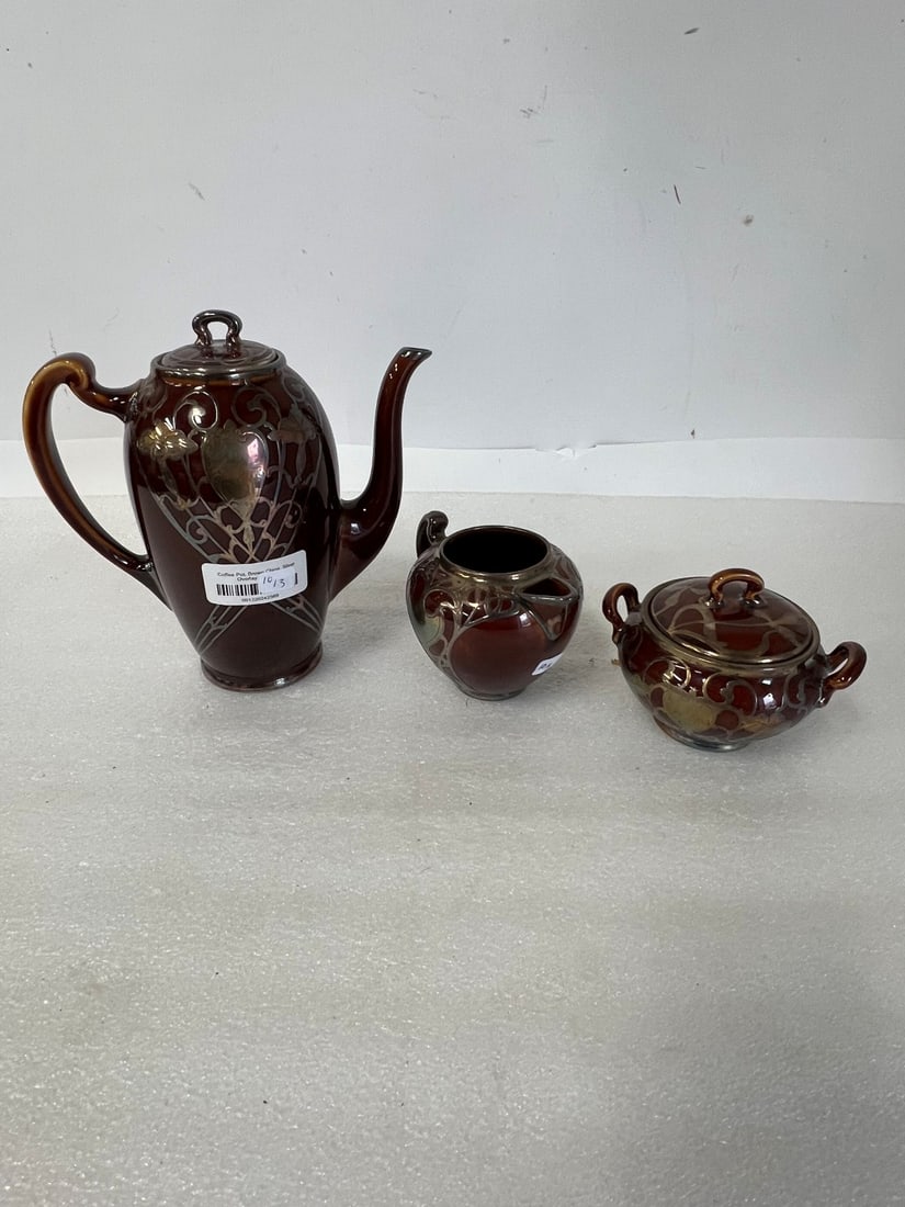 Sterling Silver Overlay Tea Set Mkd. Lenox: Marked Lenox at the underside Teapot, sugar and creamer. Teapot is 8 1/2"