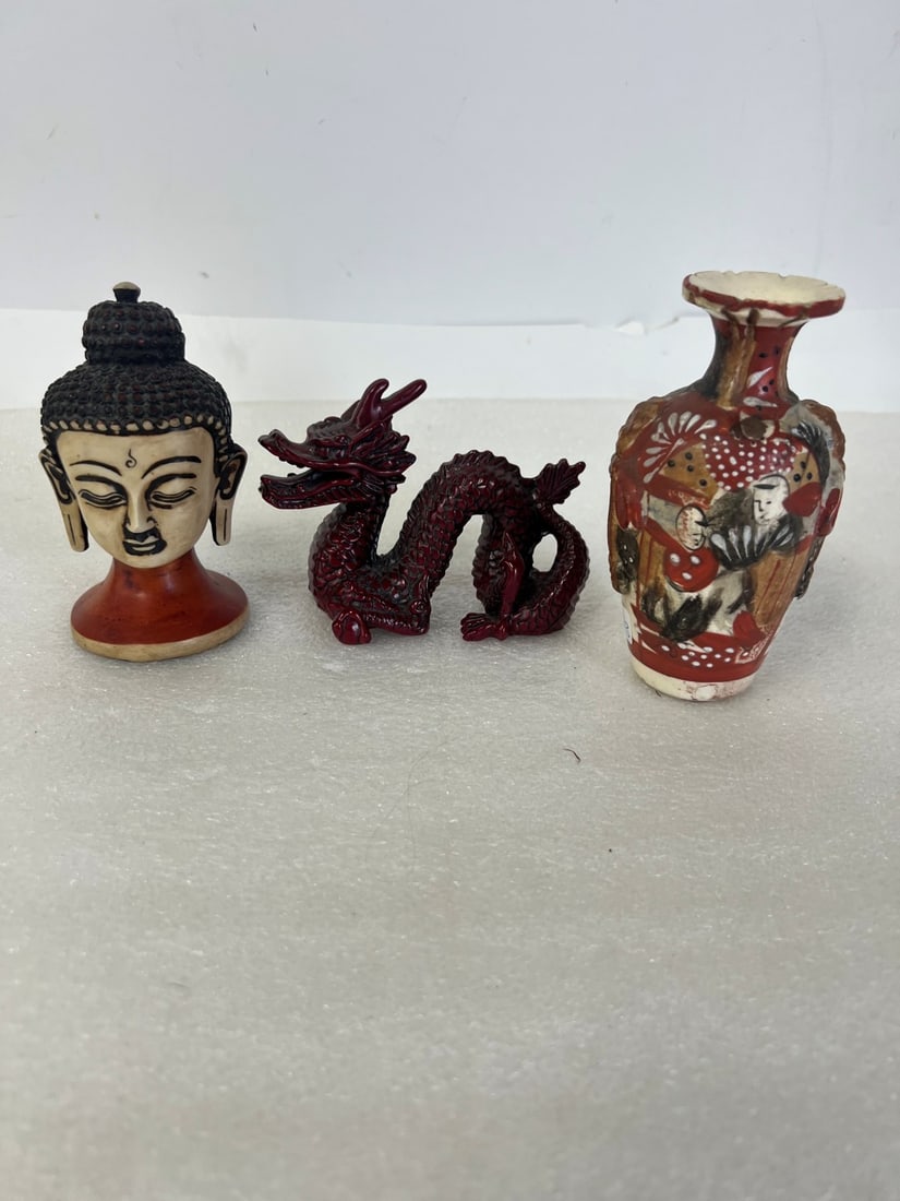 Lot of Orientalia (3): Woodem dragon, pottery buddha head and a vase; 3 1/2" to 5"