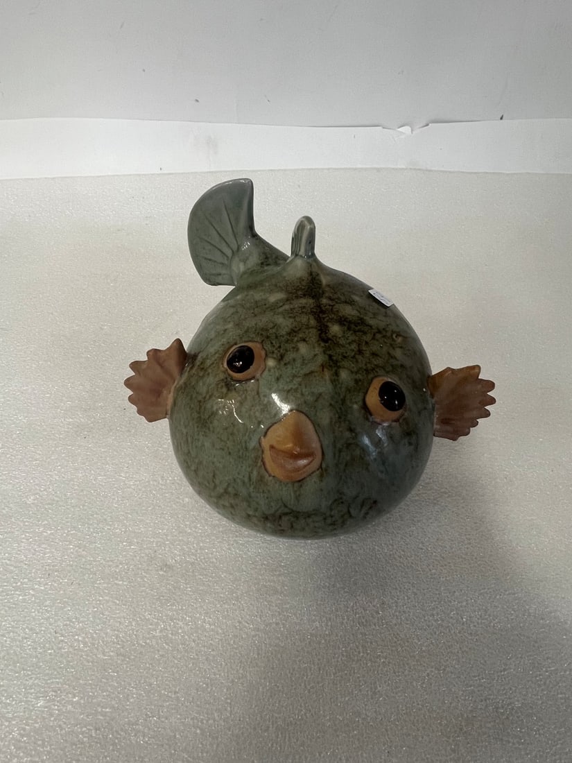 Pottery Figure of a Whale.: 6 1/4"H x 7" L Markings or numbers on the underside not discernible.