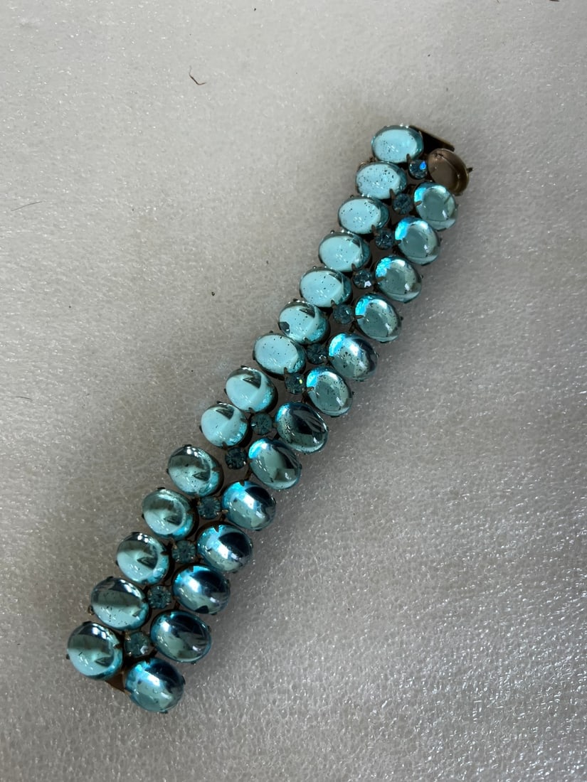Antique Blue Crystal Bracelet: Missing one stone. Elaborate.. Missing stone not noticeable as under wrist when worn