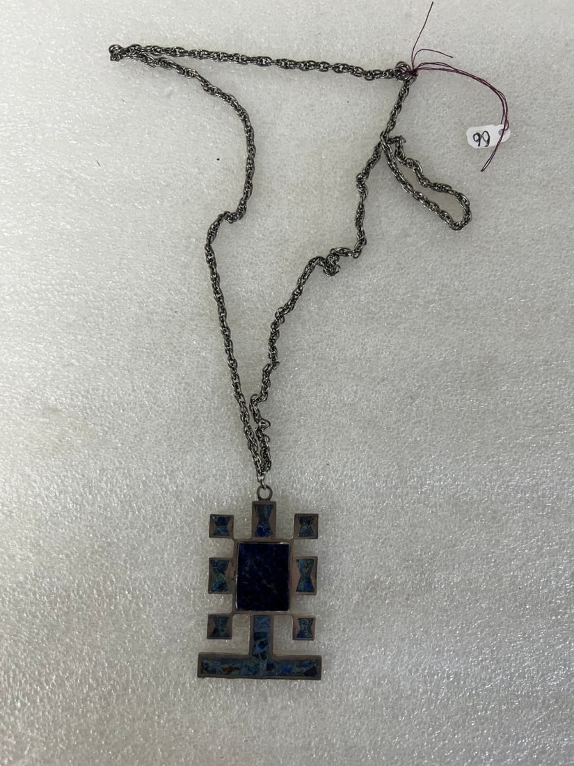 Artist Sgd. Sterling, Lapis & Turquoise Pendant: Extensively marked sterling silver, turquoise and lapis lazulli pendant , Many markigs at the back inc. artist sgnature, sterling,, Mexico etc. 3" H x 2"W on an open line chain