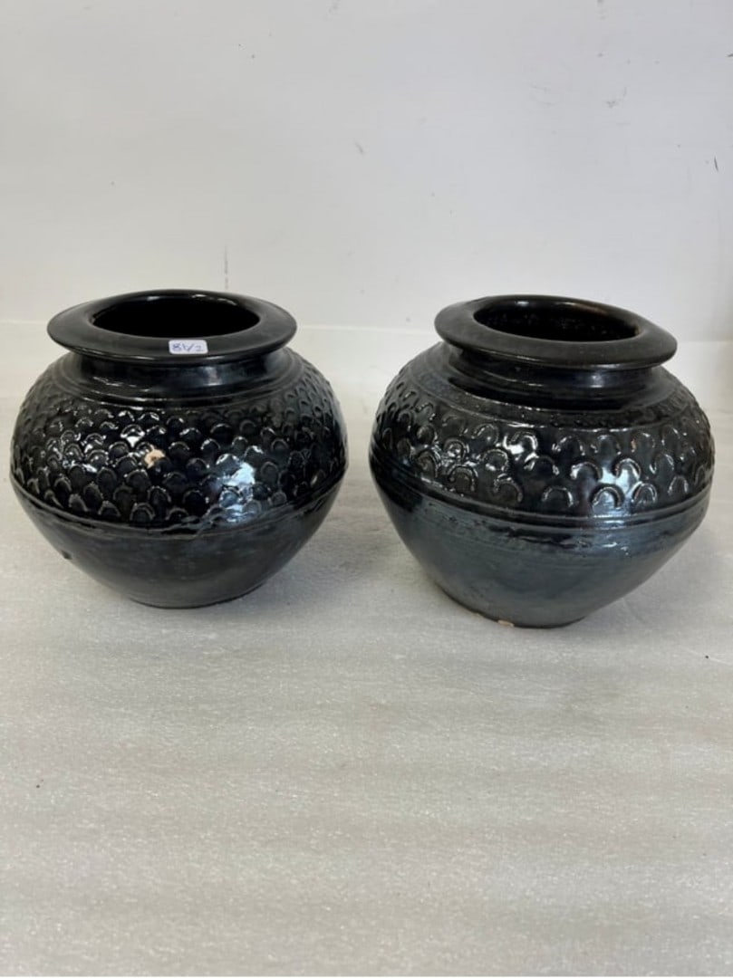 Pair of Ming Dynasty Black Glaze Jars (2): Chinese black glaze ovoid shaped jars. Single impressed mark at the base 7 3/4" H by 8" W