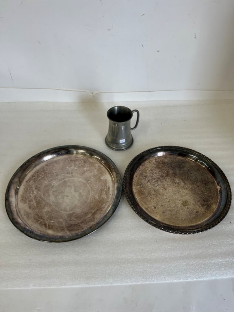 Antique Pewter Mug and Silver Plated plates (3): The Mug is Marked S.L. 11-9-68 Glass bottom and one of the plates is marked Rogers at the underside. Largest Plate 13" W Smallest Plate 12 1/2" W Mug is 5" H
