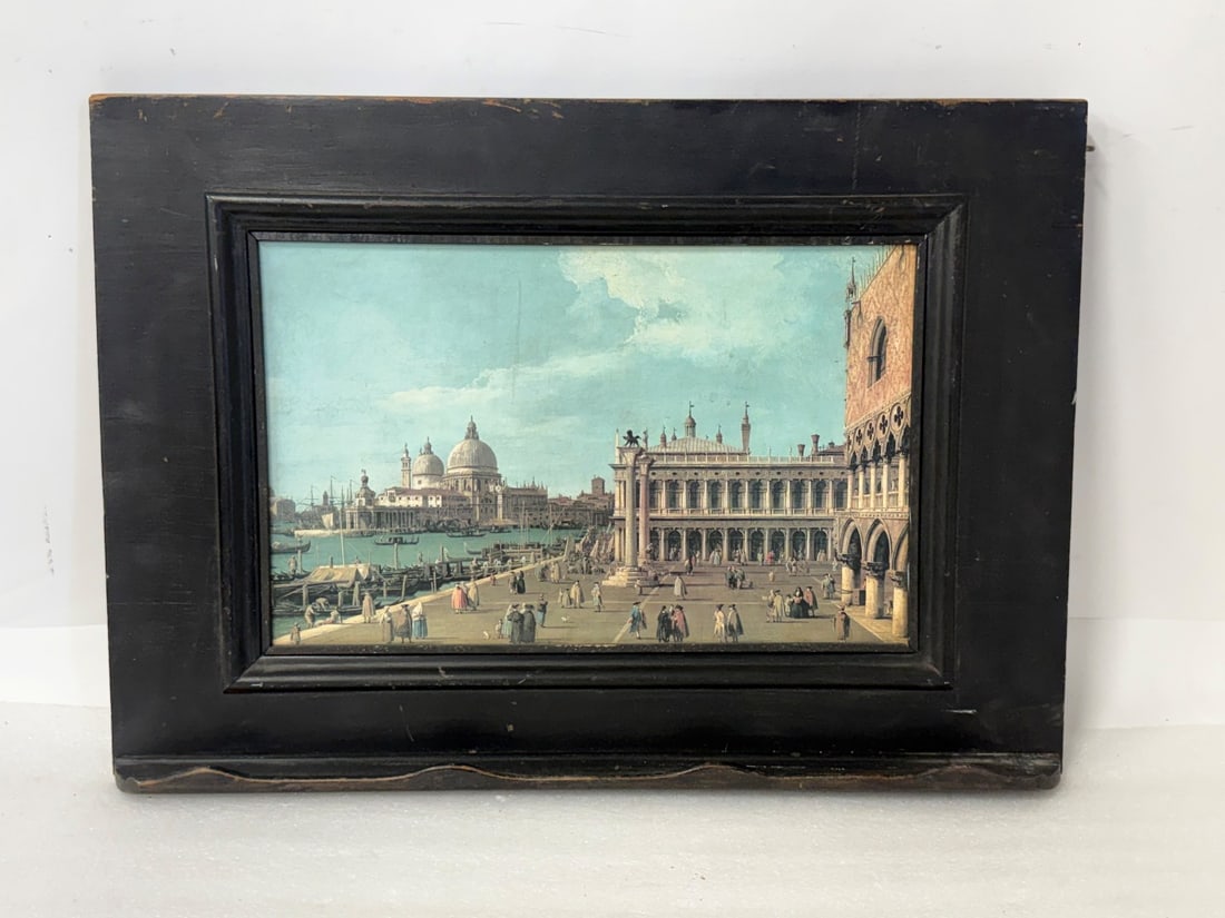 Giovanni Antonio Canaletto(after); Nicely framed Print: Framed print. The Molo with Santa Maria della Salute. After Canaletto. Ebonized wood frame with shelf; 17in. x 24in.