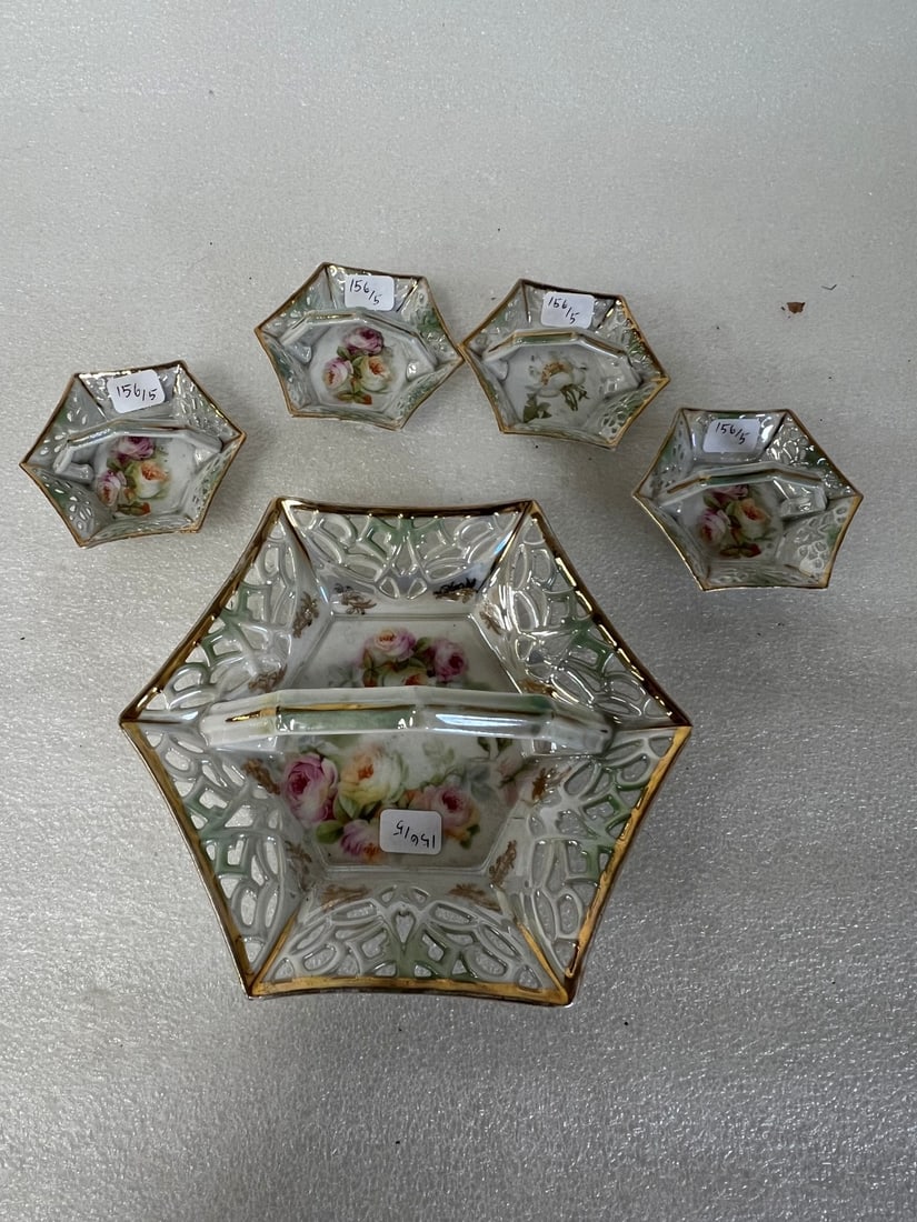 M W Co German Serving Set: Handled Serving Dish and four servers. All gilt rimmed and reticulted. 6 3.4"D and 3" D Five pcs. to the set.