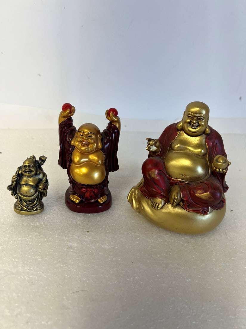 Lots Of Buddah Figurines (3): 3 in the lot. Tallest is 4.5"H by 3.75"W. Smallest is 2.25"H
