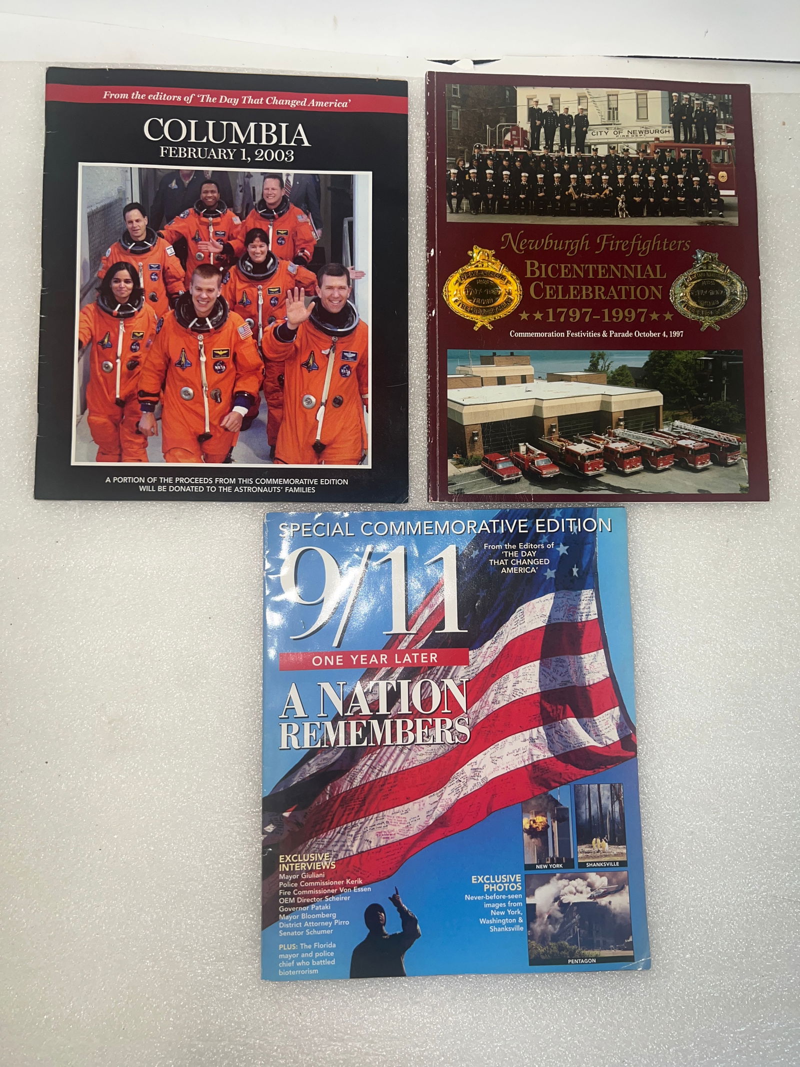 1997 Newburgh Firefighters Bicentennial Book & Others (3): 1797-1997 Newburgh Firefighters Commemoration Festivities and Parade Book, Oct 4 1997 and two others, Columbia, Feb. 1, 2003 and 9/11 One Year Later A Nation Remembers Two magazines and soft cover boo