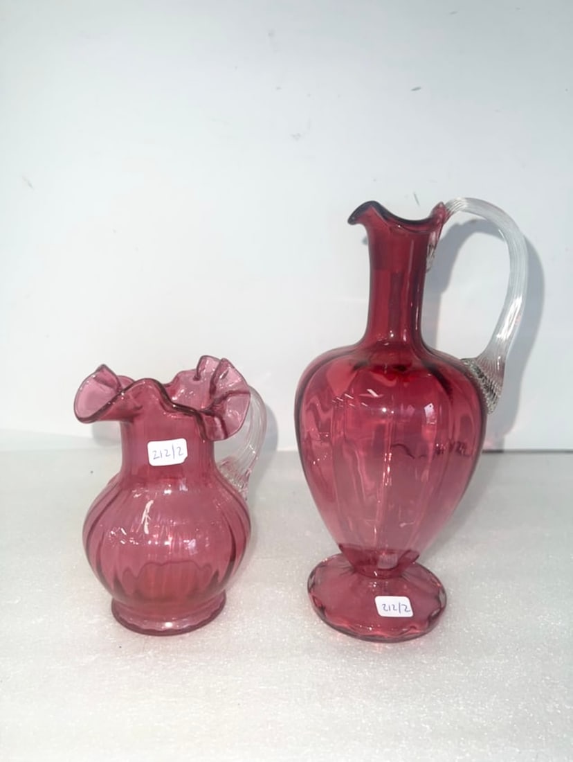 Antique Cranberry Glass Pitchers (2): As pictured. One 5.5"H and one 9"H