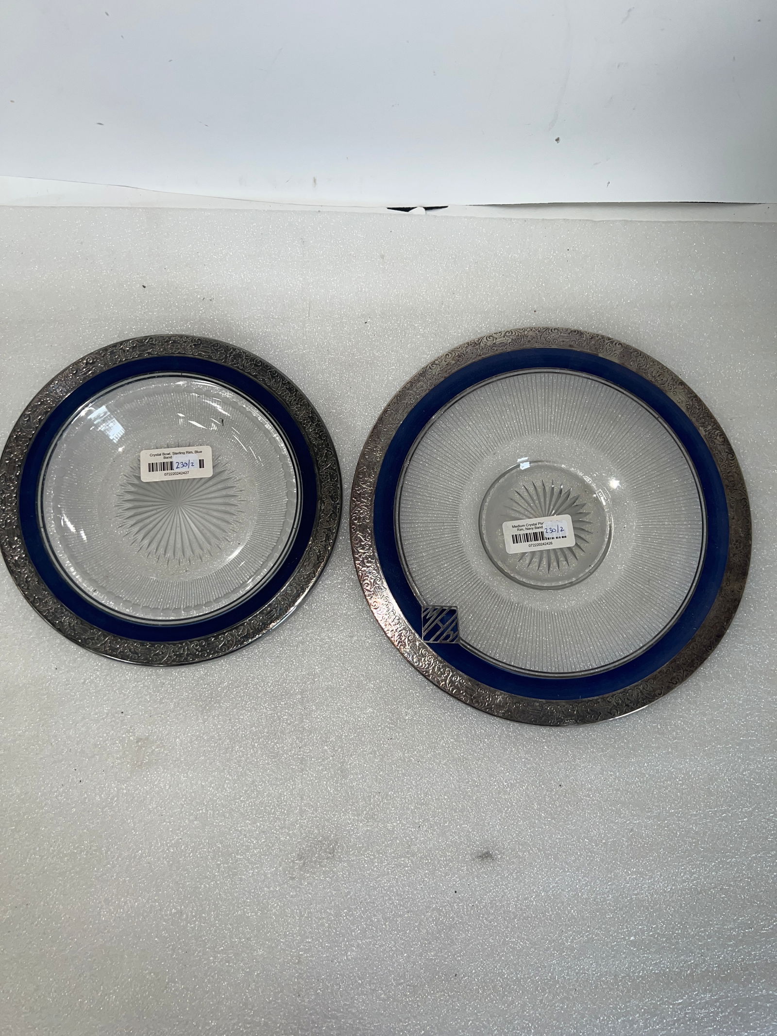 Sterling and Navy Blue Rimmed Glass Bowls (2): Larger one with MHW at rim. 12"D and 9 1/4"D. Smaller one more like a bowl. Larger one more like a platter