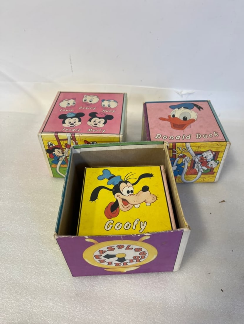Original Disney Stacking Blocks: 10" H all with Disney Characters on each one. This is from the 1950's