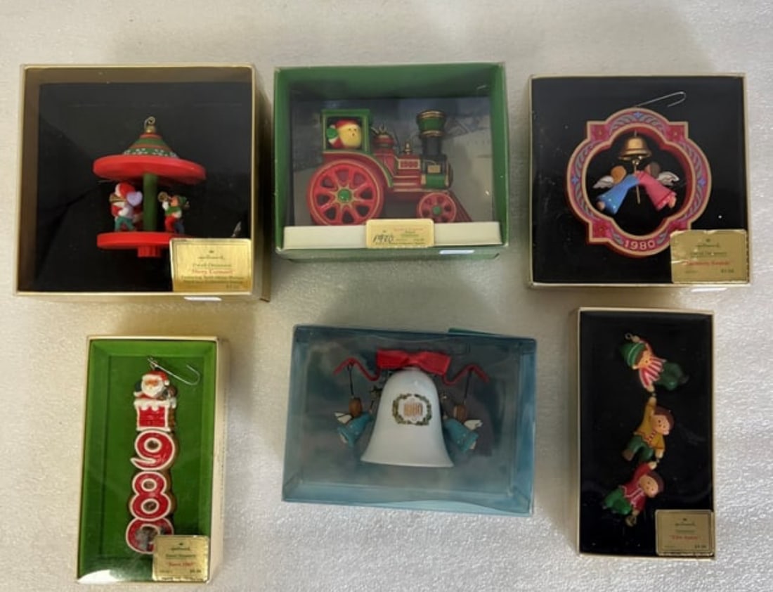 Hallmark Ornaments (6) 1980: Lot includes: "Santa's Express", "Heavenly Sounds", "Merry Carousel", "Elfin Antics", "Santa 1980", and "The Bellringers". All dated 1980. In original boxes.