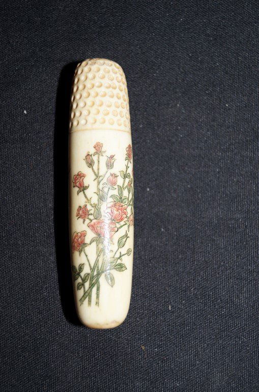 Marine Ivory Needle Case: With polychromed decorations of bird and flora; 3.25in. H.