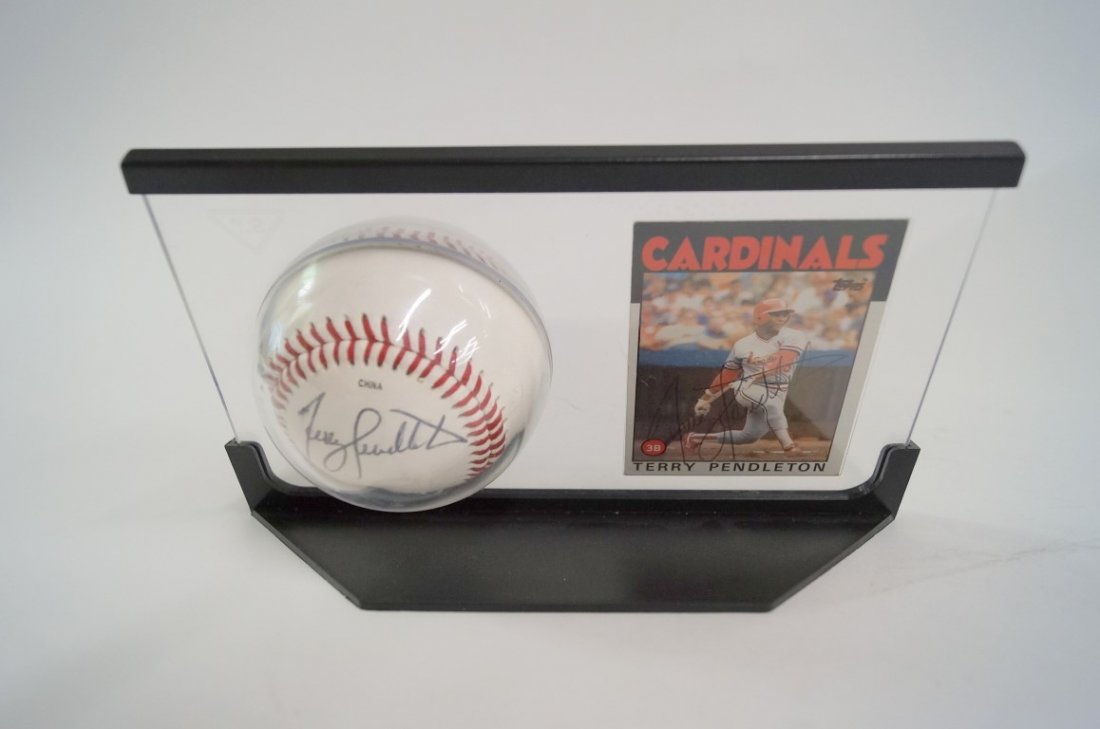 Terry Pendelton autographed ball and baseball card: Signed baseball and playing card. Framed; 5in. X 8in.