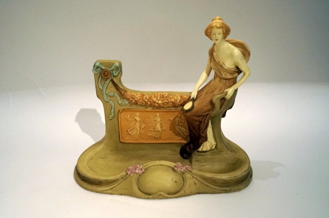 Royal Dux porcelain figural boudoir mirror signed: Hand painted Art Nouveau porcelain mirror. Seated woman. Marked and numbered at bottom; 16in. H. x 16in. W., glass missing