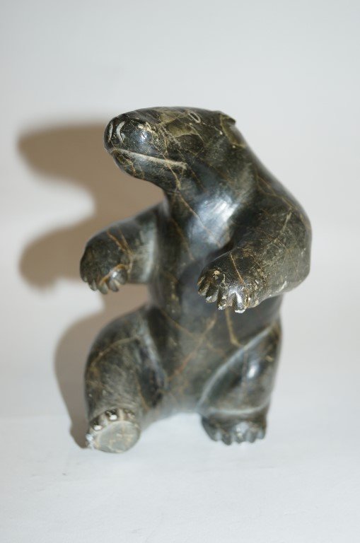 Inuit Eskimo carved bear: Carved stone figure of a bear. Inscribed at underside; 5.75in. H.