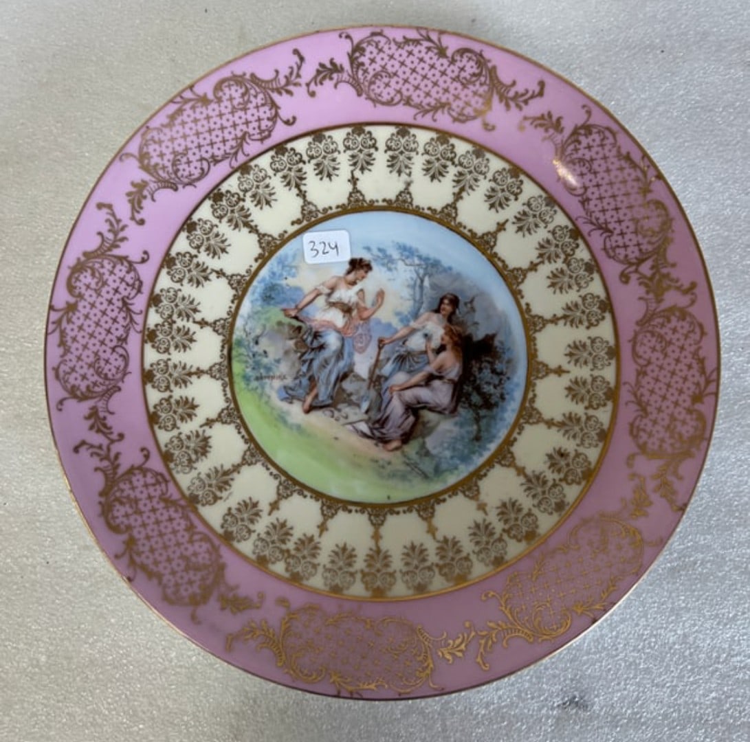 Victoria Carlsbad Austria Plate: Marked at the underside Victoria Carlsbad Austria. Classical Scene at the center. Gilt rim.10"D