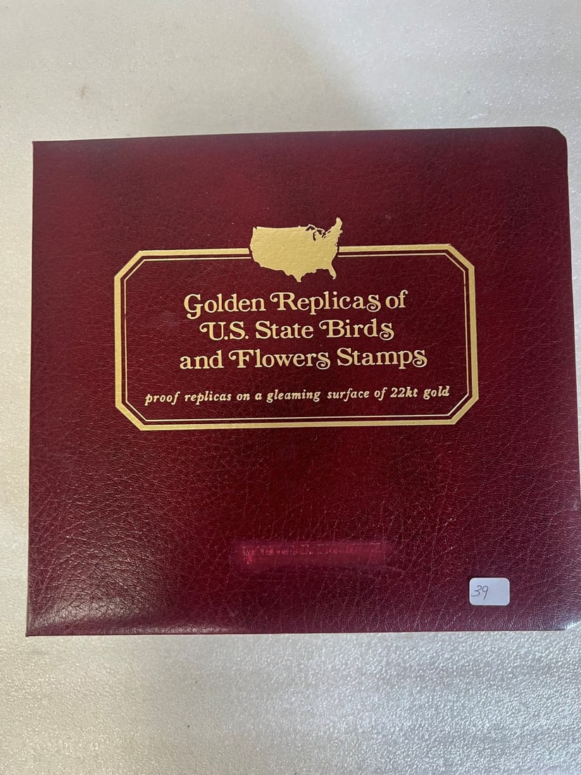 22K Gold Replicas of U. S. Stamps,: Postal Commemorative Society Proof Replicas on a gleaming surface of 22K Gold
