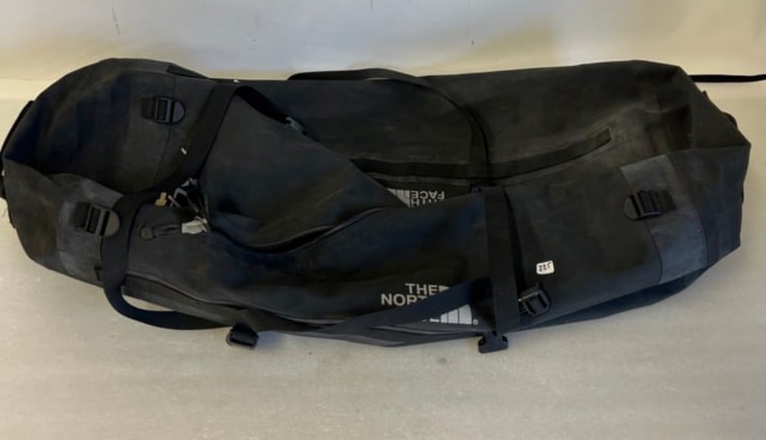 North Face Avalanche Waterproof Duffel Bag.: Straps for wearing and zippers to close. 36"L