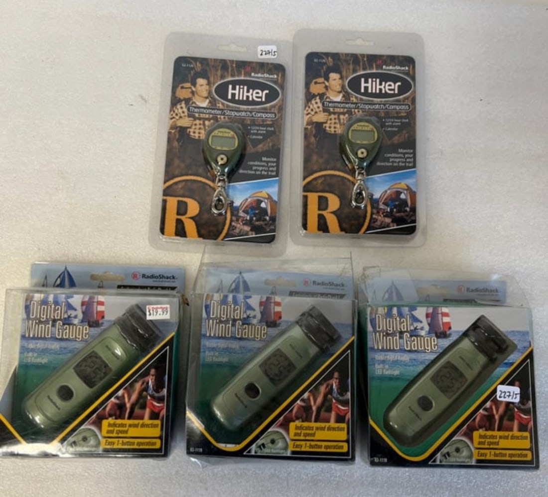 Digital Wind Gauge (3) Hiker Therm/Compass/Stopwatch (2): Five items in the lot. All as pictured. All in original packaging New. Never Used.