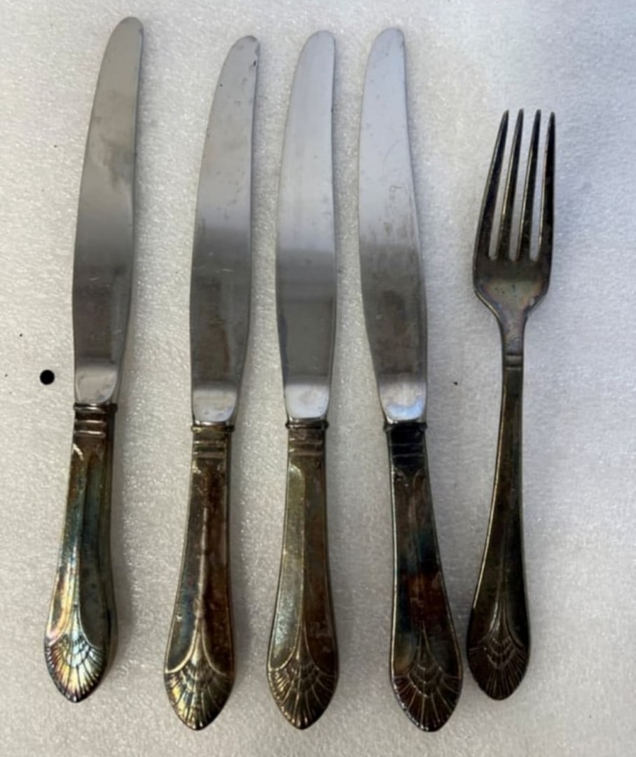 S. S. United States Silverware (5): A fork and four knives with markings indicating it is from tje ship S. S. United States. Five pcs. in the lot.