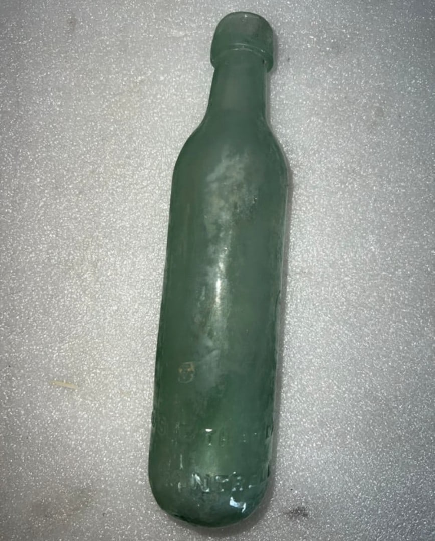 Antique Green Glass Bottle. Round Bottom: Marked See That Each Cork is Branded Cantrell & Cochrane . Marked at the bottom Dublin & Belfast 9"H