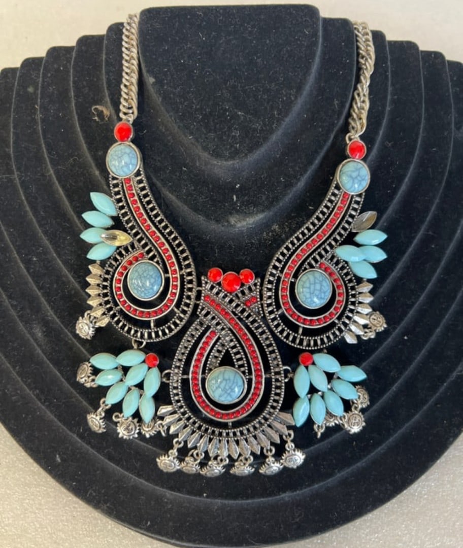American Southwestern Indian Necklace: Coral, turquoise and silver. As pictured. Missing one stone.