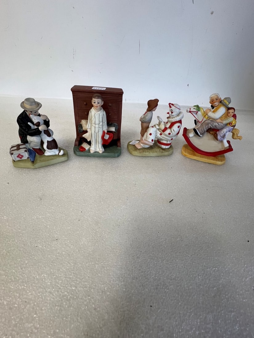 Collectors Lot of Danbury Mint Figurines (4): Four in the lot. As Pictured. Tallest is 4"H and smallest is 3"H. Lot includes "Homecoming", Off-Duty Clown", "Gramps at the Reins" and "Bottom Drawer".