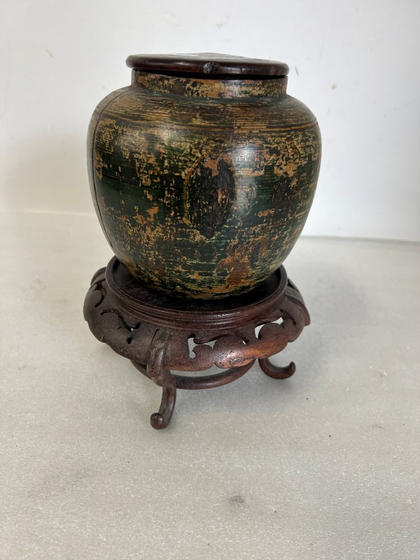 Oriental Covered Jar on Teakwood Stand: 11"H with stand. Hard to discern if pottery or wood. We believe wooden.