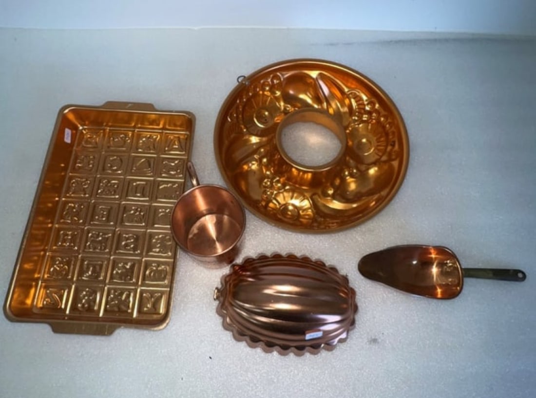 A Dealer or Collector's Lot of Copper (5): Two molds; a scoop, a cup and baking pan Five pcs. in the lot. The cup embossed United by Blue and marked across cup and at the underside. Hand Welded. Varyng sizes as pictured. 12"L (pan) to 4"H