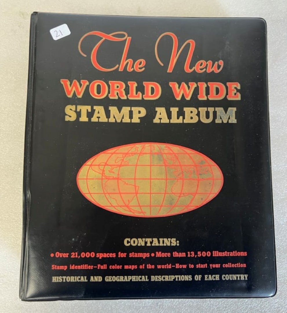 The New World Wide Stamp Album: Inside contains some stamps on pages which will be photographed.