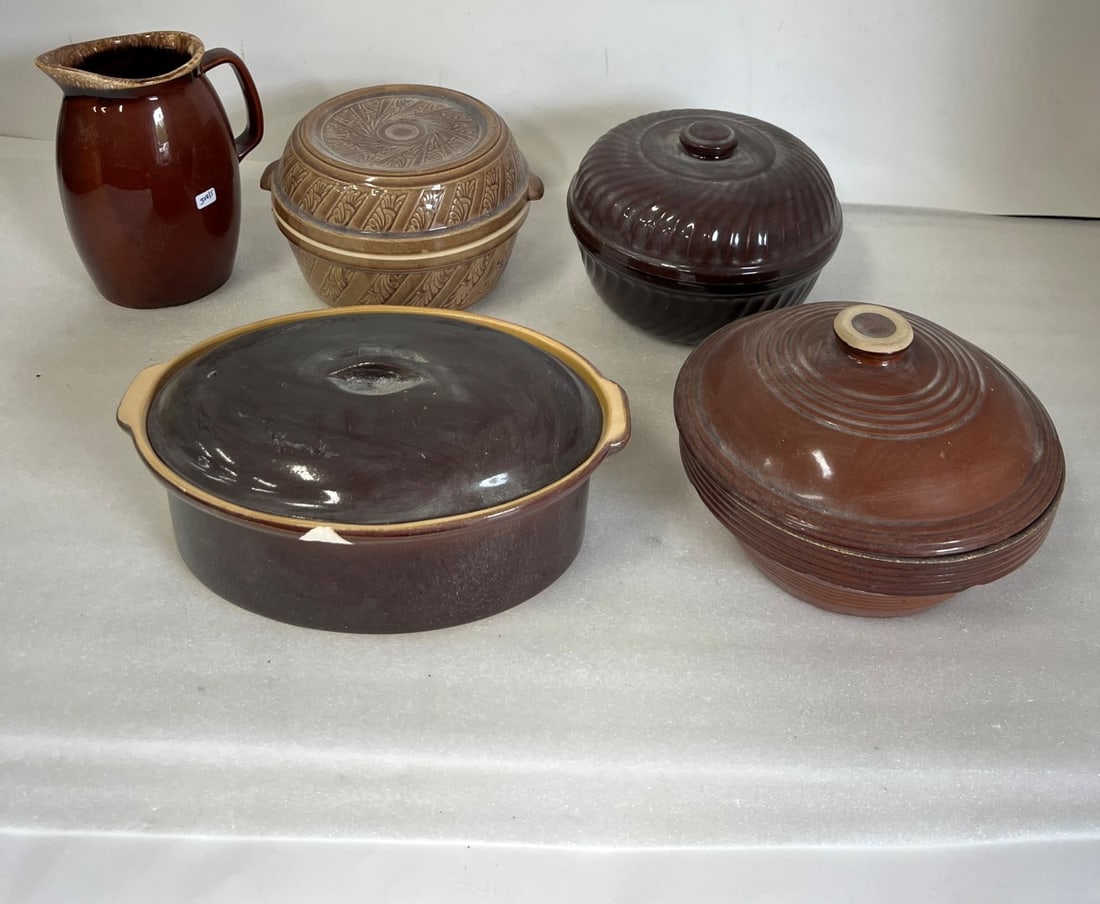 Brown Stoneware Pitcher & 4 Covered Bowls (5): 9 1/2"H and all about 6 " H and 9 1/2"W ( all approx.) Five items in the lot