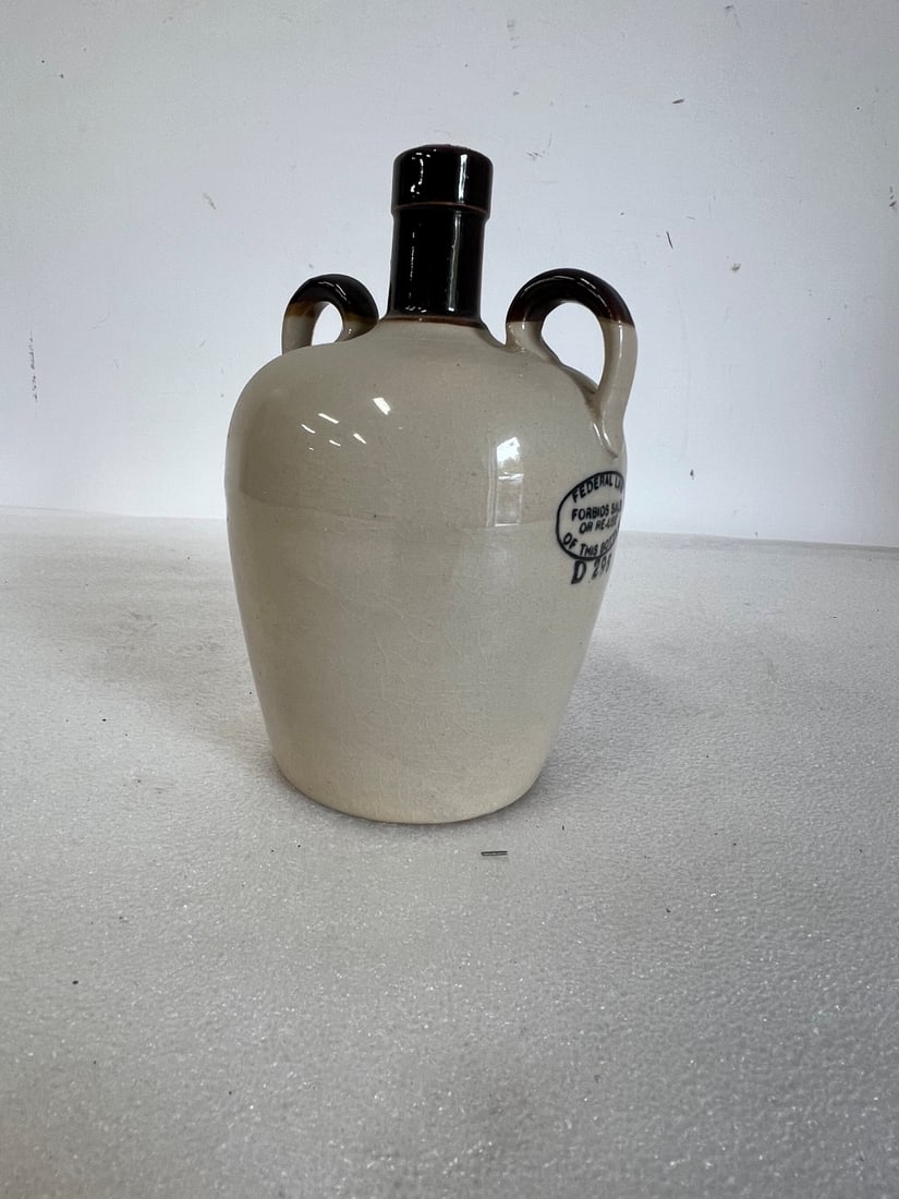 Stoneware Jug. "Federal Law Prohibits Sale" (1 of 2)