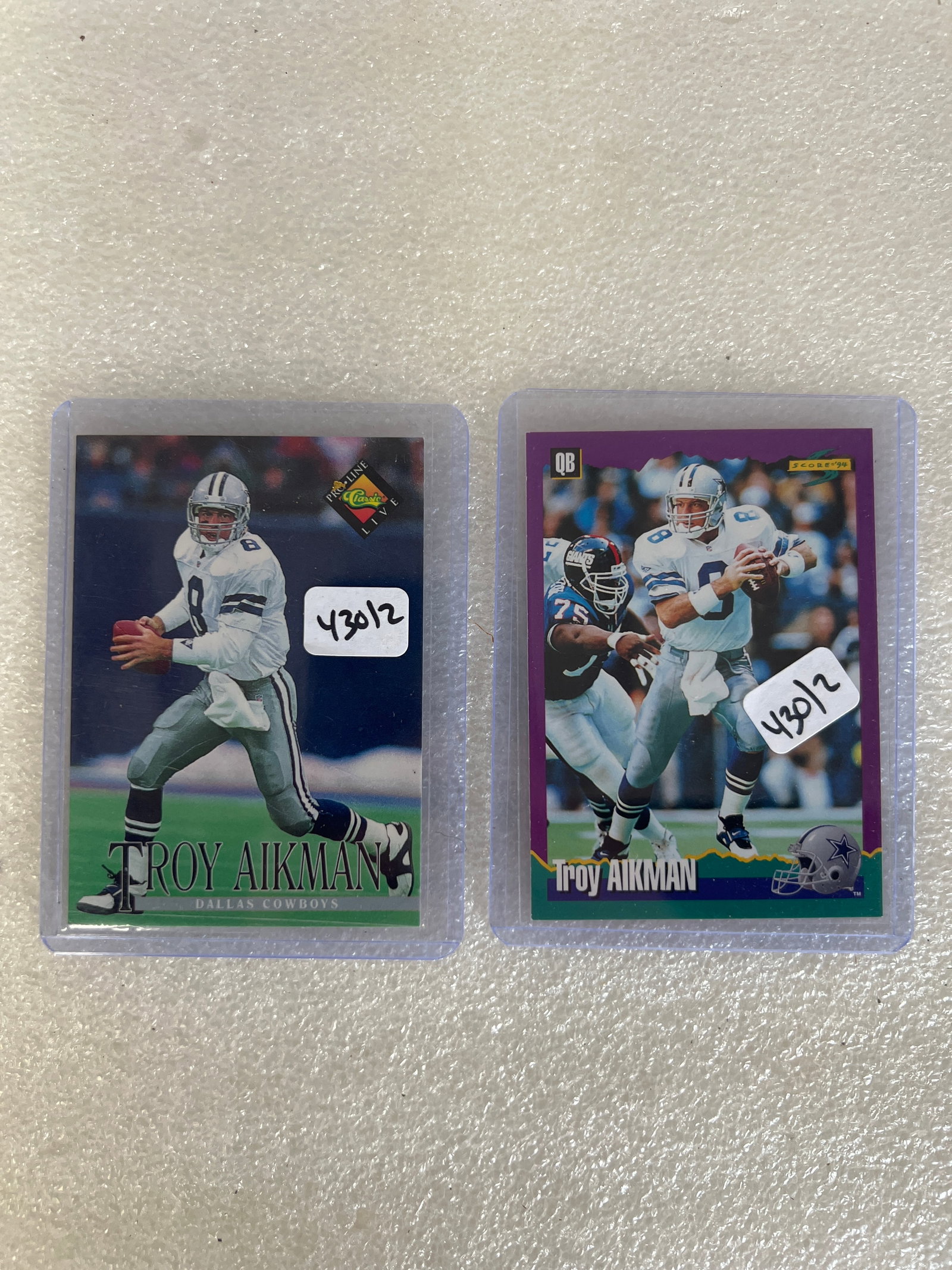 Troy Aikman Football Sports Cards (2): Lot includes one QB card and one Pro-line. As Pictured.