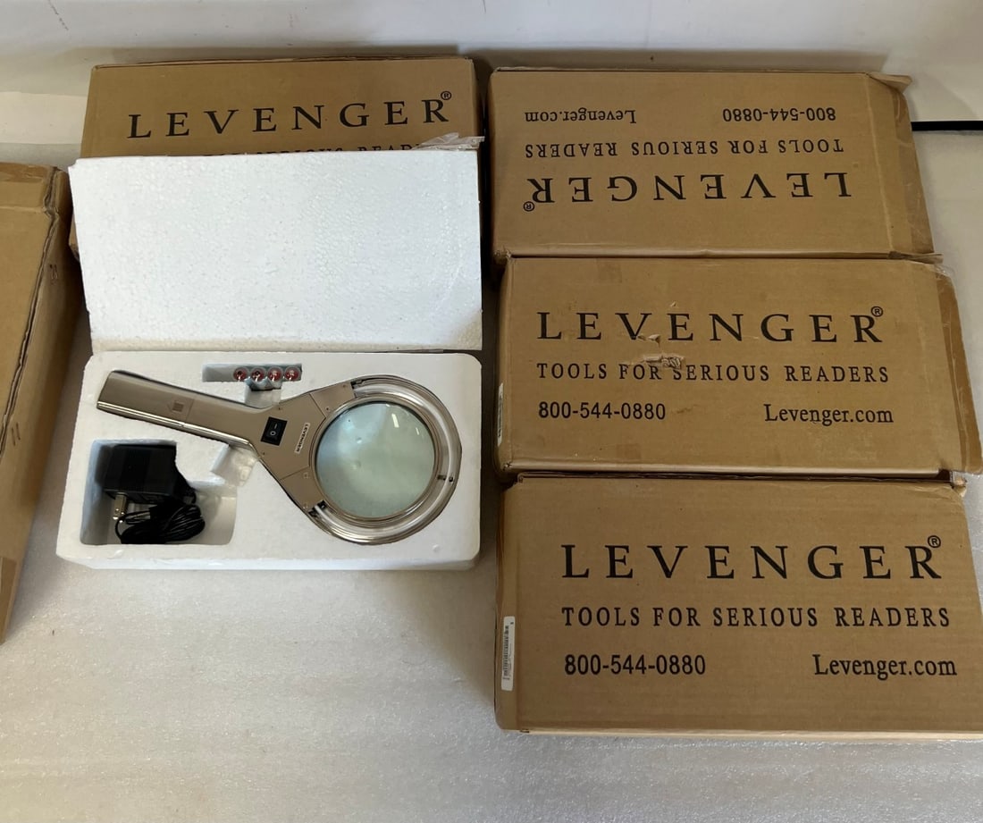 Magnifying Glasses (5): Commercial quality. 11" L 5"W at center of glass.