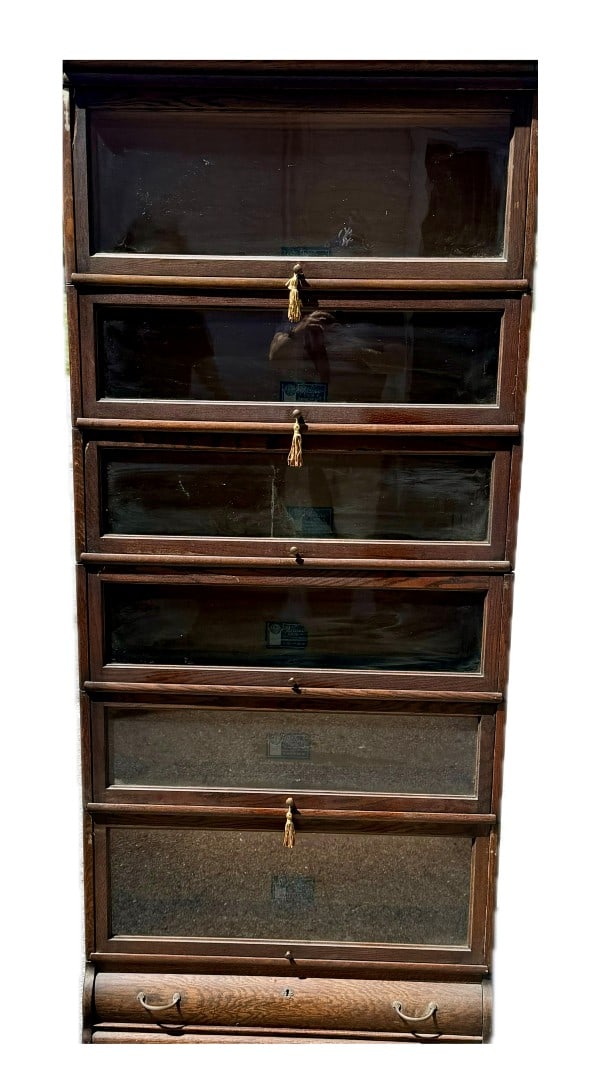 Viking Six-Section Oak Barrister Bookcase: Six-sectioned oak Barrister's bookcase. Original labels; 77.5in.H. x 37in.W. x 9.5in.D.