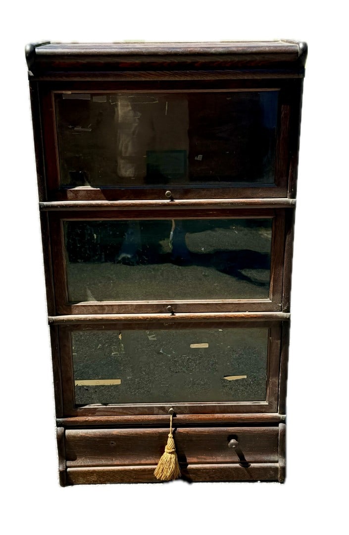 Globe-Wernicke Three-Section Oak Barrister Bookcase: Three-sectioned oak Barrister's bookcase. Original labels; 48in.H. x 26in.W. x 12in.D.